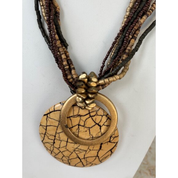 Multistrand Beaded Necklace With Crackled Resin Pendant & Gold-Tone Accents Eart - Picture 1 of 7
